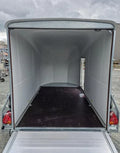 Remorque cargo Pullman Debon 1300 bleue avec suspension et porte latérale